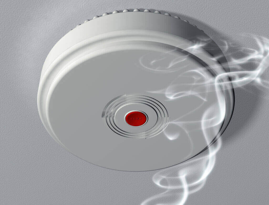 old smoke alarms being tested and replaced for landlord in Balmoral