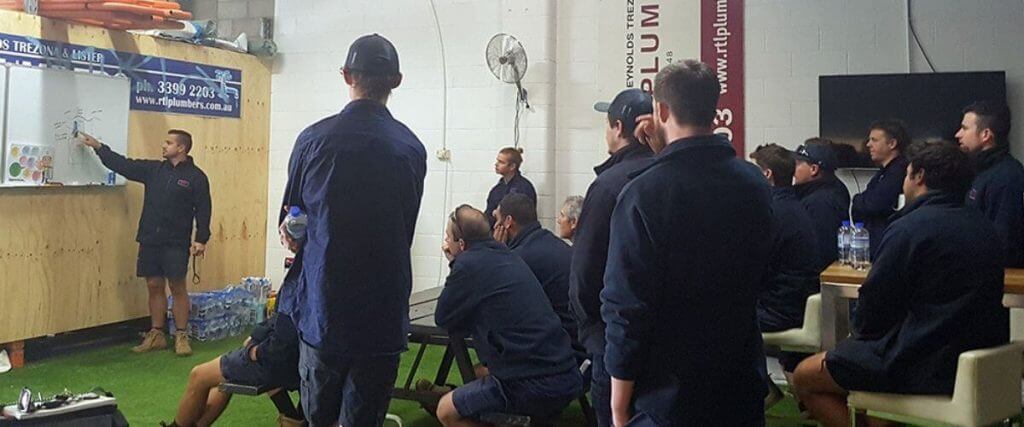 RTL Plumbing team getting briefed on large commercial plumbing job in Brisbane
