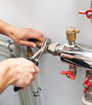 Plumber doing preventative plumbing in Brisbane