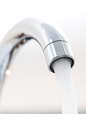 plumber carrying out water servicing for commercial properties in Brisbane